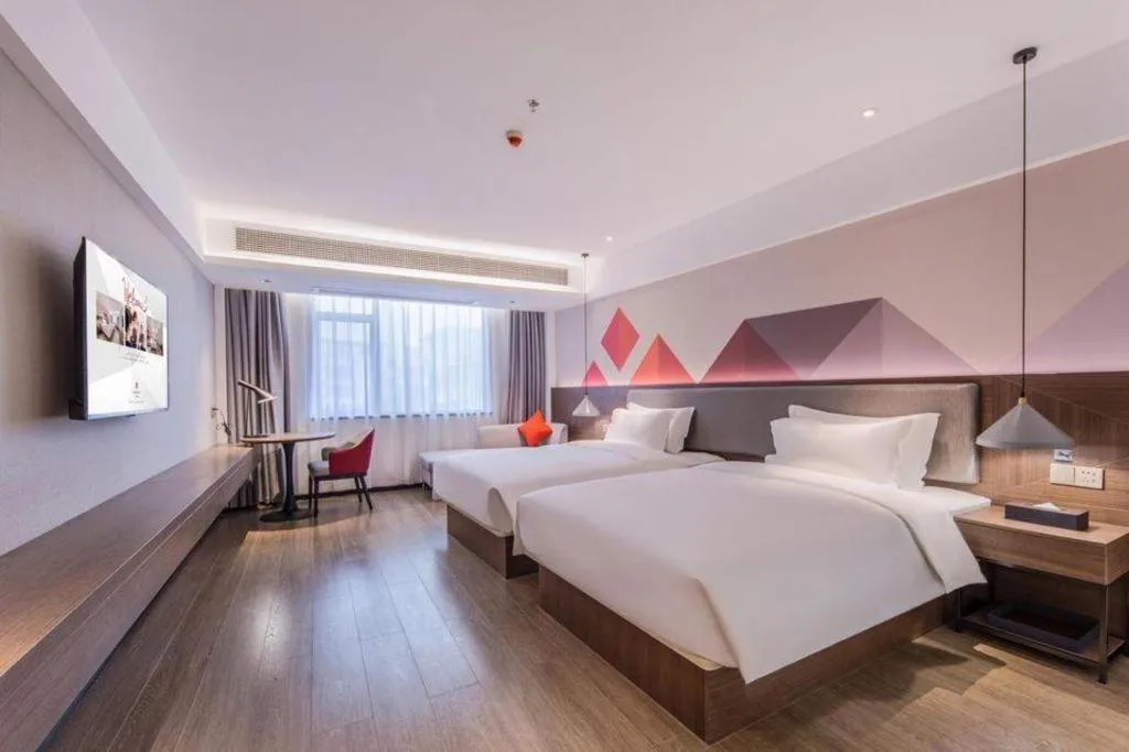 Bed in Borrman Hotel Hezhou High Speed Railway Station Guangming Avenue