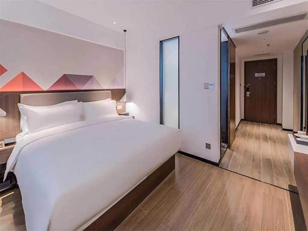 Bed in Borrman Hotel Hezhou High Speed Railway Station Guangming Avenue