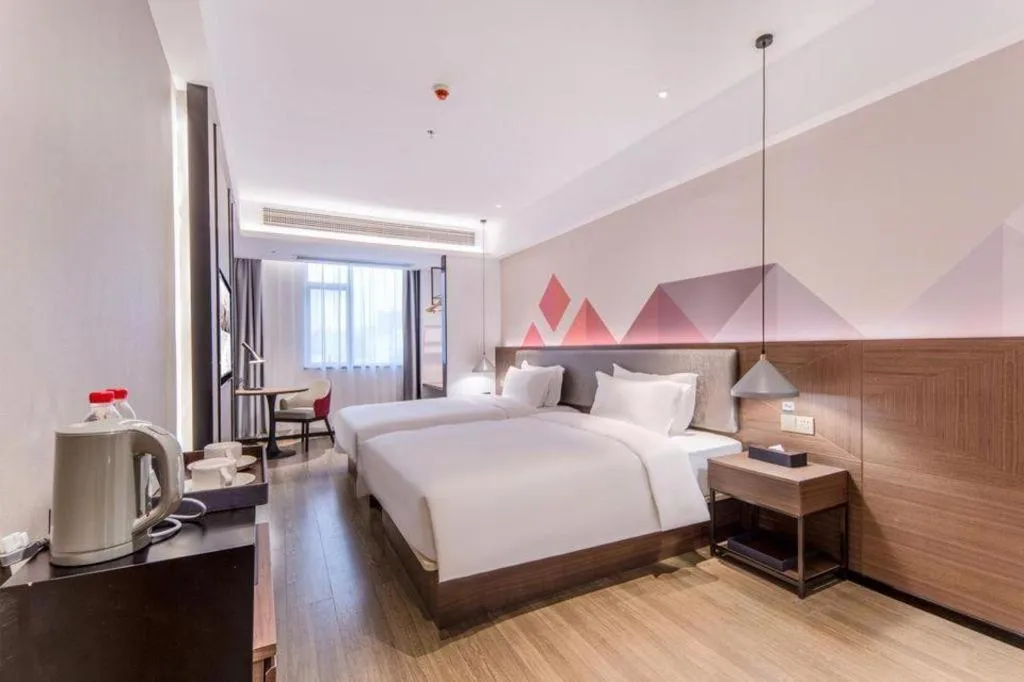 Bed in Borrman Hotel Hezhou High Speed Railway Station Guangming Avenue