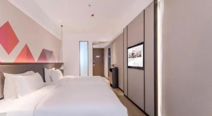 Bed in Borrman Hotel Hezhou High Speed Railway Station Guangming Avenue Bed in Borrman Hotel Hezhou High Speed Railway Station Guangming Avenue