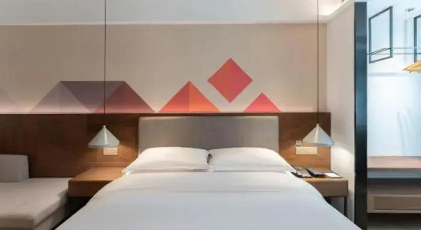 Bed in Borrman Hotel Hezhou High Speed Railway Station Guangming Avenue Bed in Borrman Hotel Hezhou High Speed Railway Station Guangming Avenue