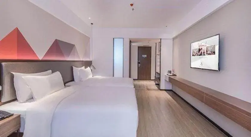 Bed in Borrman Hotel Hezhou High Speed Railway Station Guangming Avenue Bed in Borrman Hotel Hezhou High Speed Railway Station Guangming Avenue