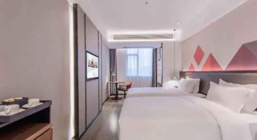 Bed in Borrman Hotel Hezhou High Speed Railway Station Guangming Avenue Bed in Borrman Hotel Hezhou High Speed Railway Station Guangming Avenue