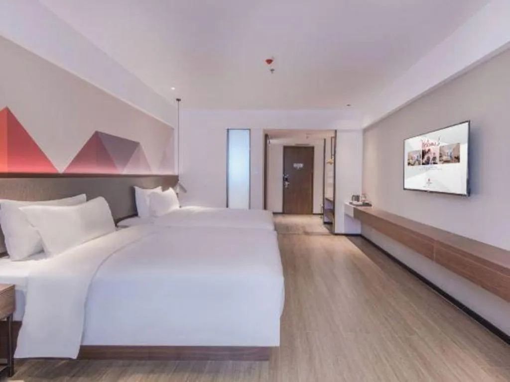 Bed in Borrman Hotel Hezhou High Speed Railway Station Guangming Avenue