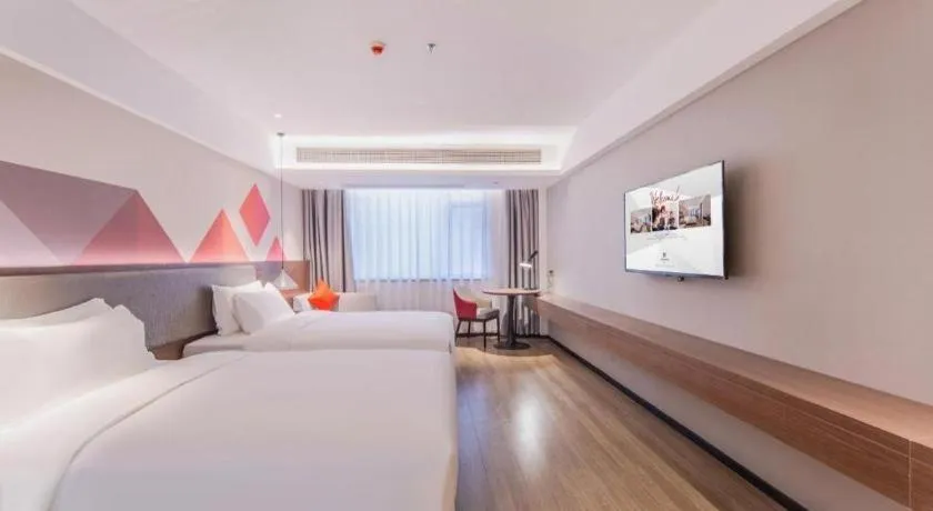 Bed in Borrman Hotel Hezhou High Speed Railway Station Guangming Avenue