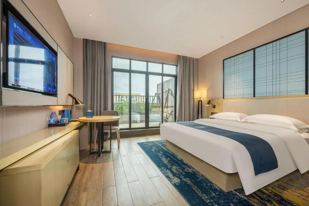 Bed in Echarm Hotel Fangchenggang Qisha