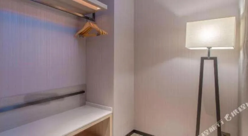 Bed in Echarm Hotel Fangchenggang Qisha