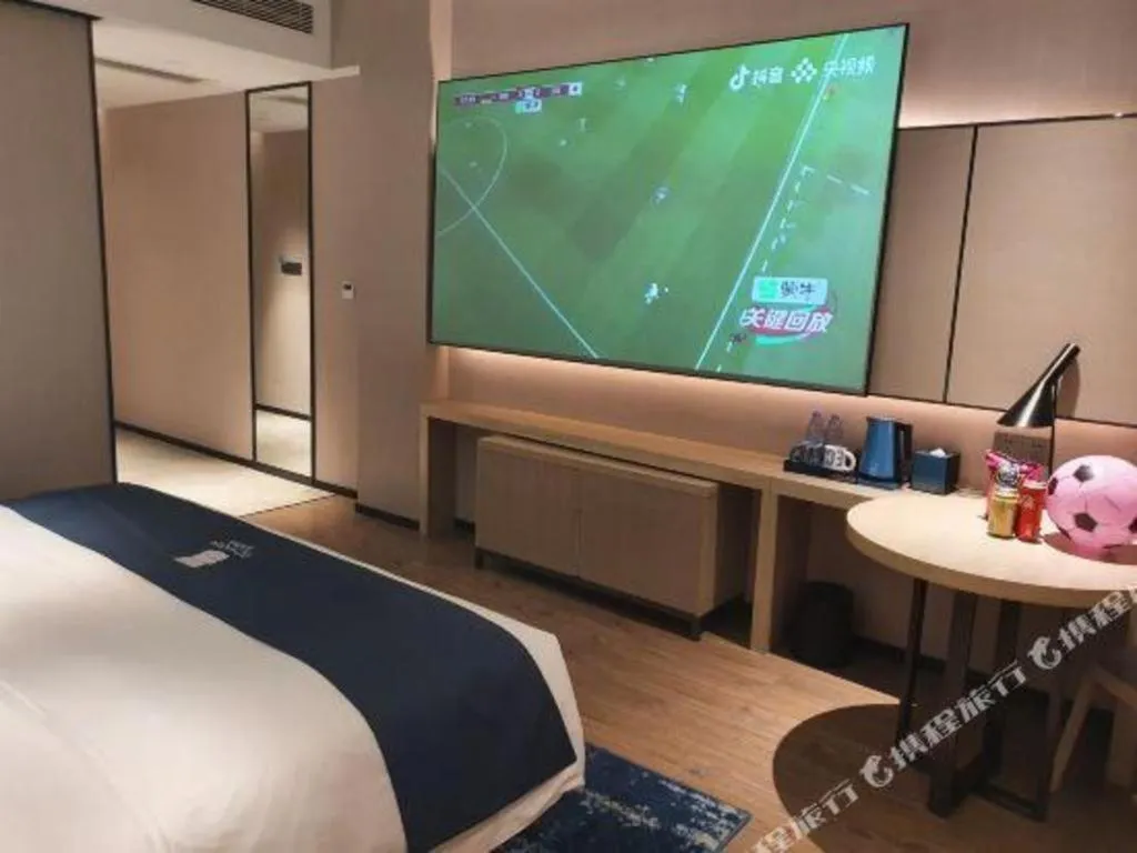 Bed in Echarm Hotel Fangchenggang Qisha