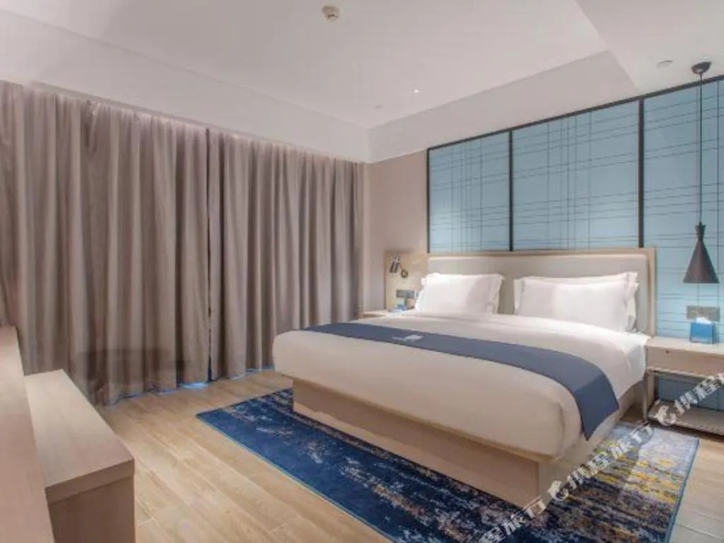 Bed in Echarm Hotel Fangchenggang Qisha