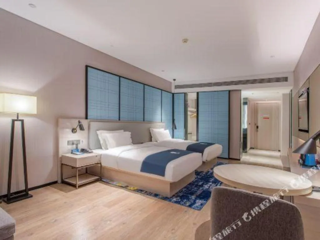 Bed in Echarm Hotel Fangchenggang Qisha