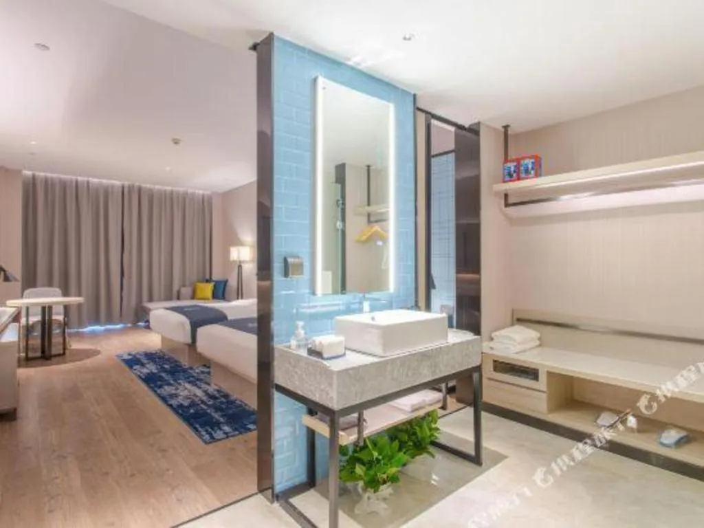 Bed in Echarm Hotel Fangchenggang Qisha