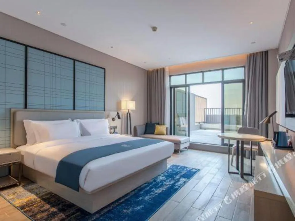 Bed in Echarm Hotel Fangchenggang Qisha