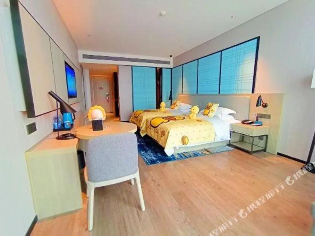 Bed in Echarm Hotel Fangchenggang Qisha