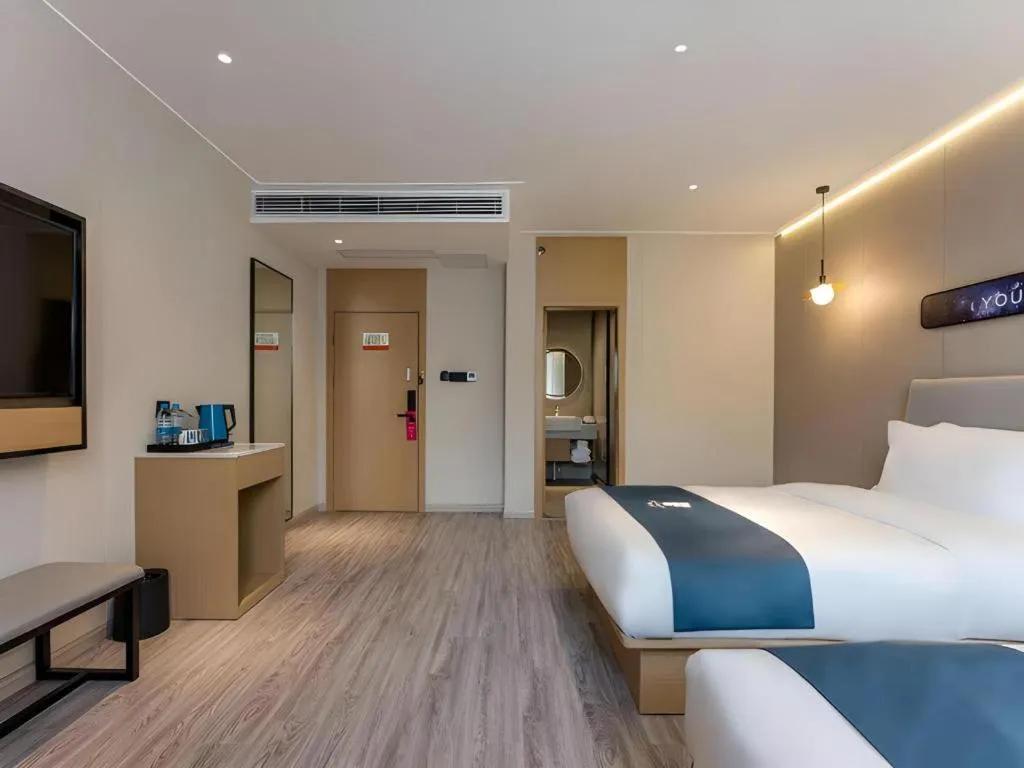 Bed in Echarm Hotel Shanghai North Bund Tilanqiao Metro Station