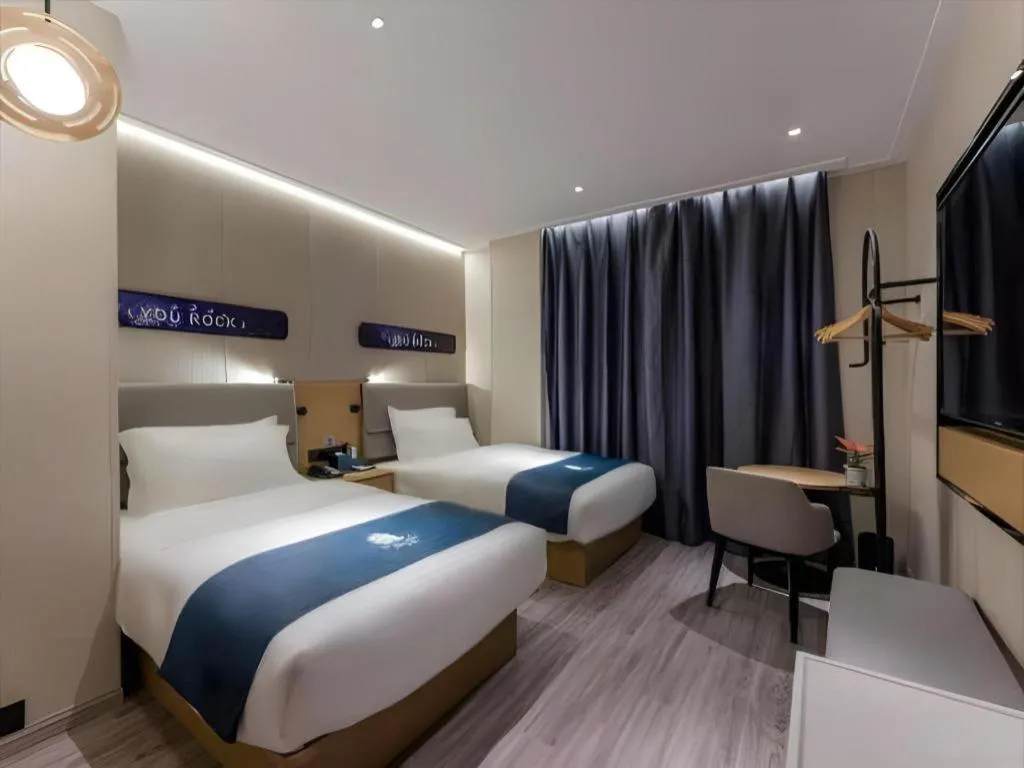 Bed in Echarm Hotel Shanghai North Bund Tilanqiao Metro Station