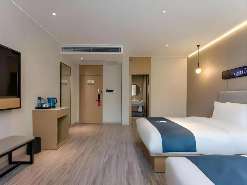 Bed in Echarm Hotel Shanghai North Bund Tilanqiao Metro Station