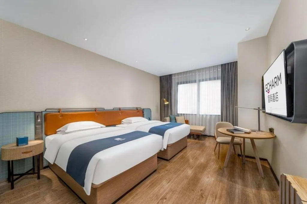 Bed in Echarm Hotel Liuzhou Yaobu Ancient Town