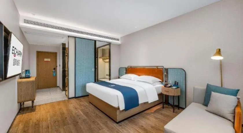 Bed in Echarm Hotel Liuzhou Yaobu Ancient Town