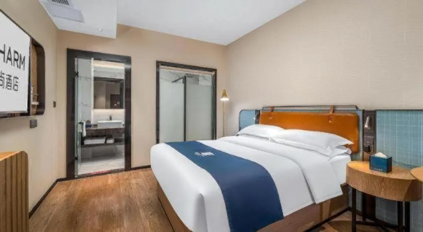Bed in Echarm Hotel Liuzhou Yaobu Ancient Town