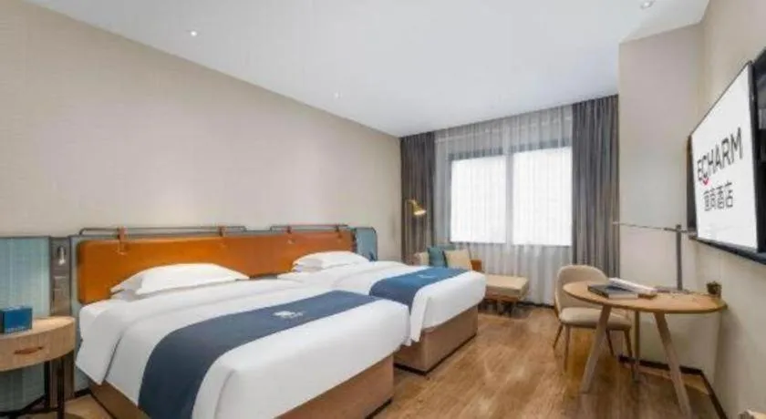 Bed in Echarm Hotel Liuzhou Yaobu Ancient Town