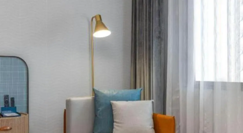 Bed in Echarm Hotel Liuzhou Yaobu Ancient Town