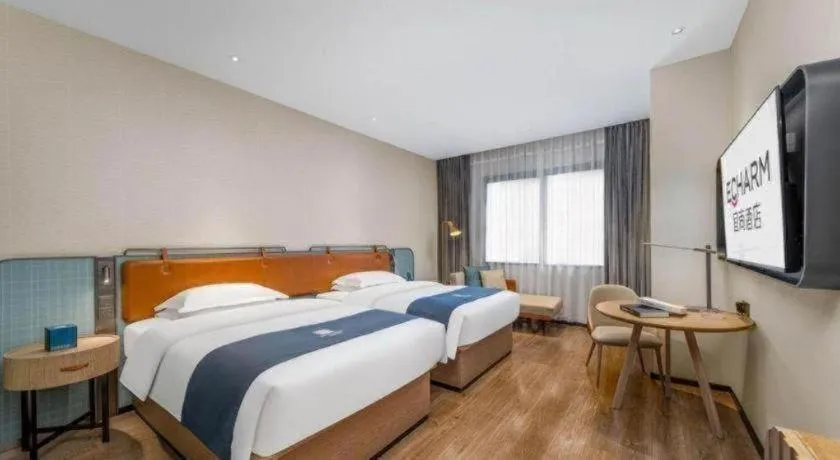 Bed in Echarm Hotel Liuzhou Yaobu Ancient Town