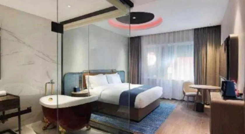 Bed in Echarm Hotel Liuzhou Yaobu Ancient Town