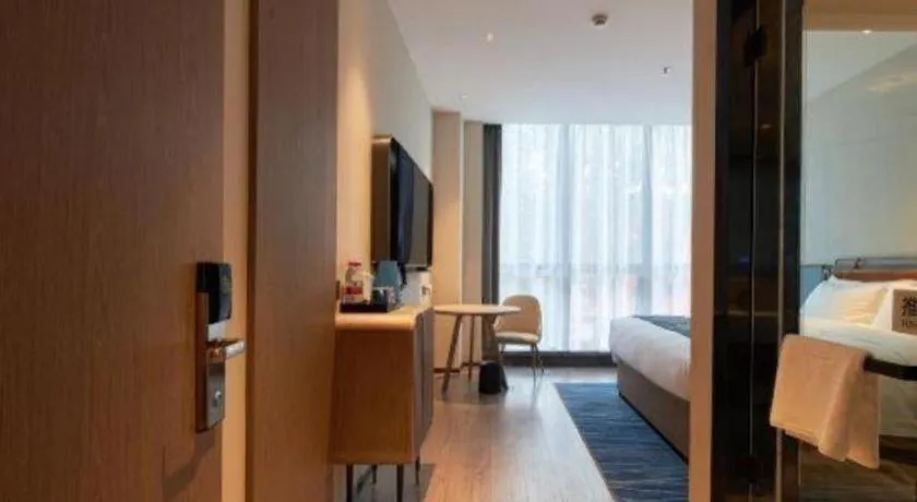 Bed in Echarm Hotel Liuzhou Yaobu Ancient Town