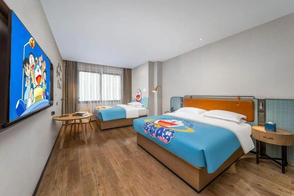 Bed in Echarm Hotel Liuzhou Yaobu Ancient Town