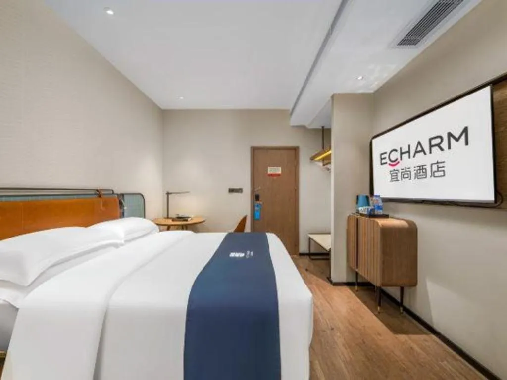 Bed in Echarm Hotel Liuzhou Yaobu Ancient Town