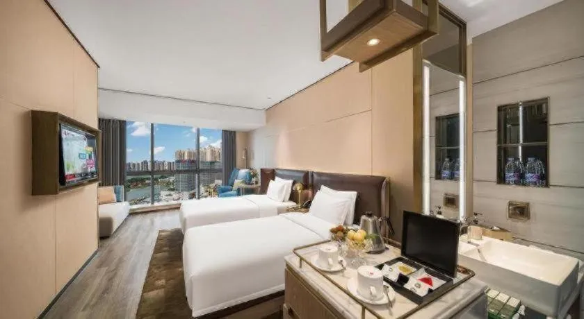 Bed in Premier City Comfort Hotel Quanzhou Wanda Plaza