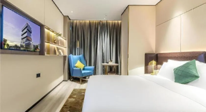 Bed in Premier City Comfort Hotel Quanzhou Wanda Plaza