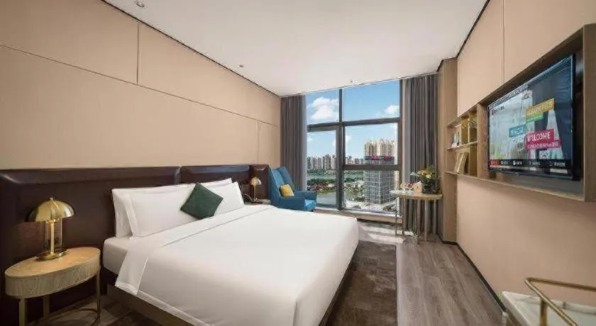 Bed in Premier City Comfort Hotel Quanzhou Wanda Plaza