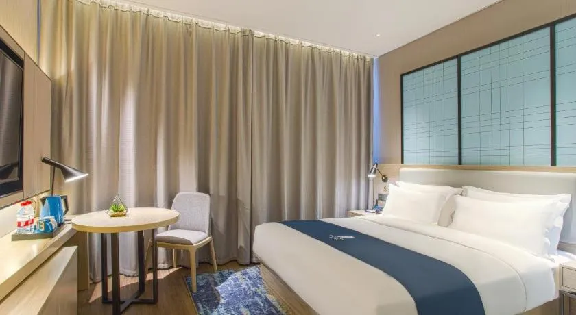 Bed in Echarm Hotel Liuzhou Liudong Wuling Liuzhou Automobile