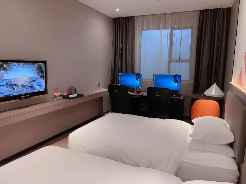 Bed in Borrman Hotel Zhonghsan Guzheng Huayi Plaza Light Rail Station