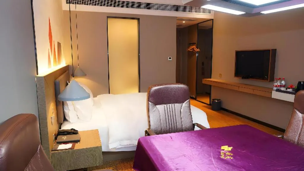 Bed in Borrman Hotel Zhonghsan Guzheng Huayi Plaza Light Rail Station