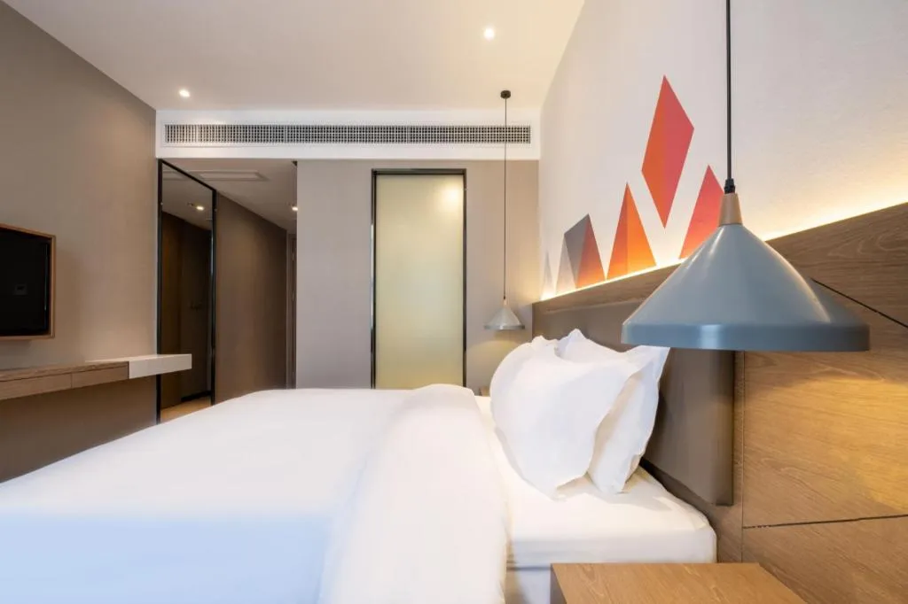 Bed in Borrman Hotel Zhonghsan Guzheng Huayi Plaza Light Rail Station