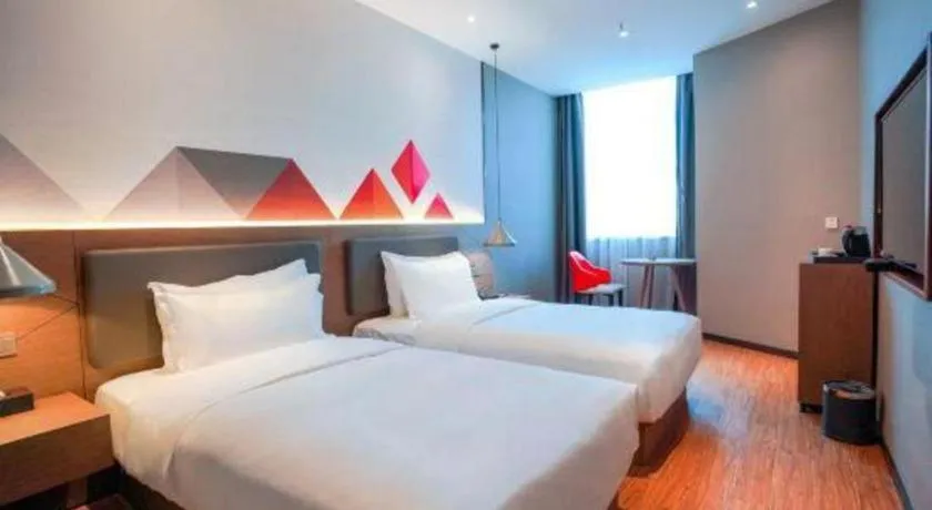 Bed in Borrman Hotel Zhonghsan Guzheng Huayi Plaza Light Rail Station