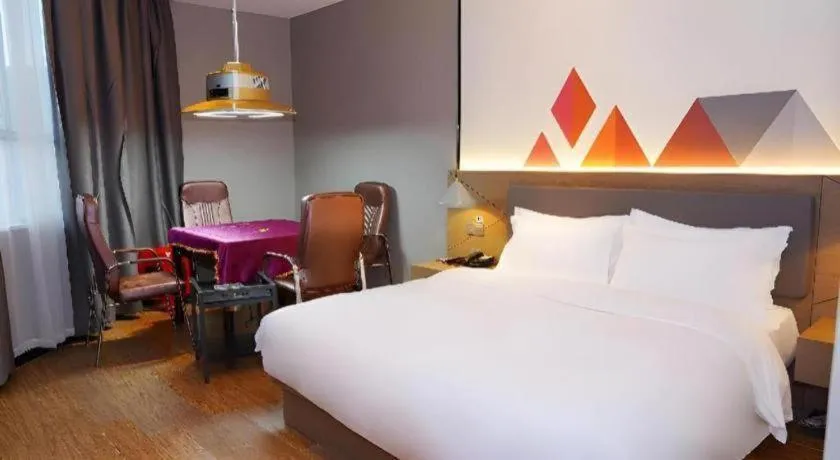 Bed in Borrman Hotel Zhonghsan Guzheng Huayi Plaza Light Rail Station