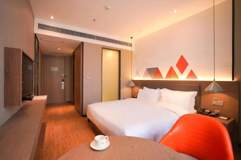 Bed in Borrman Hotel Zhonghsan Guzheng Huayi Plaza Light Rail Station