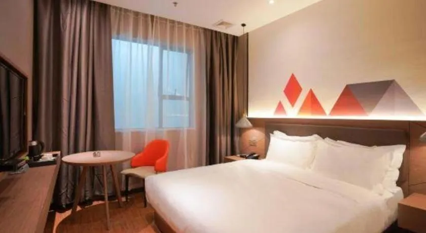Bed in Borrman Hotel Zhonghsan Guzheng Huayi Plaza Light Rail Station