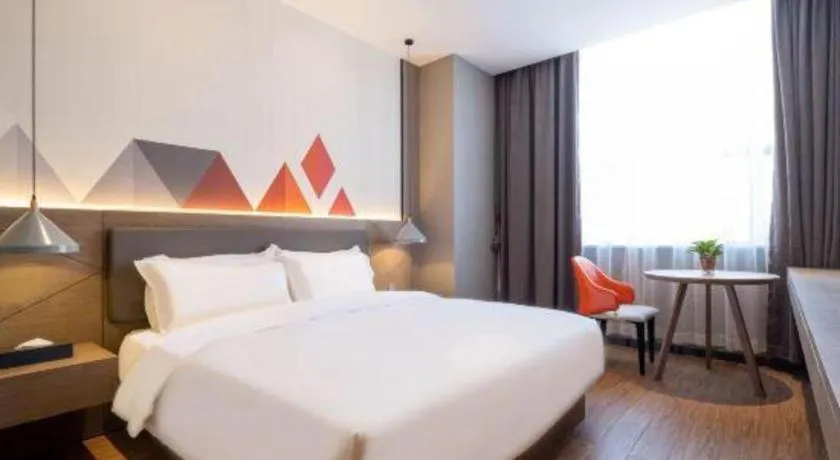 Bed in Borrman Hotel Zhonghsan Guzheng Huayi Plaza Light Rail Station
