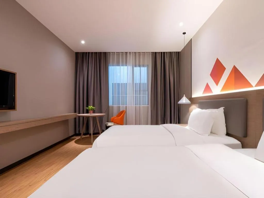 Bed in Borrman Hotel Zhonghsan Guzheng Huayi Plaza Light Rail Station