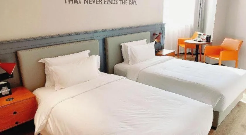 Bed in Premier City Comfort Hotel Wuhan Yellow Crane Shouyi Road Metro Station