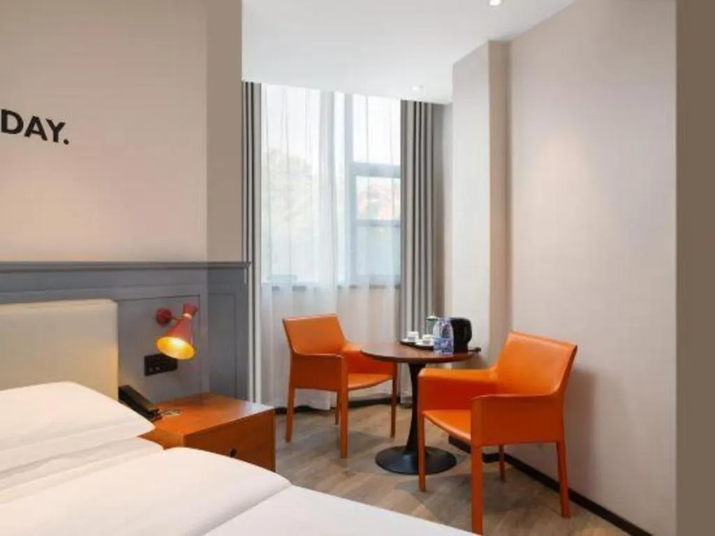 Bed in Premier City Comfort Hotel Wuhan Yellow Crane Shouyi Road Metro Station