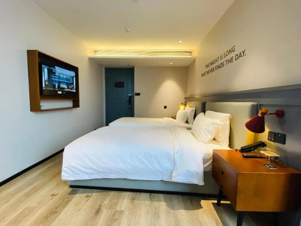 Bed in Premier City Comfort Hotel Wuhan Yellow Crane Shouyi Road Metro Station