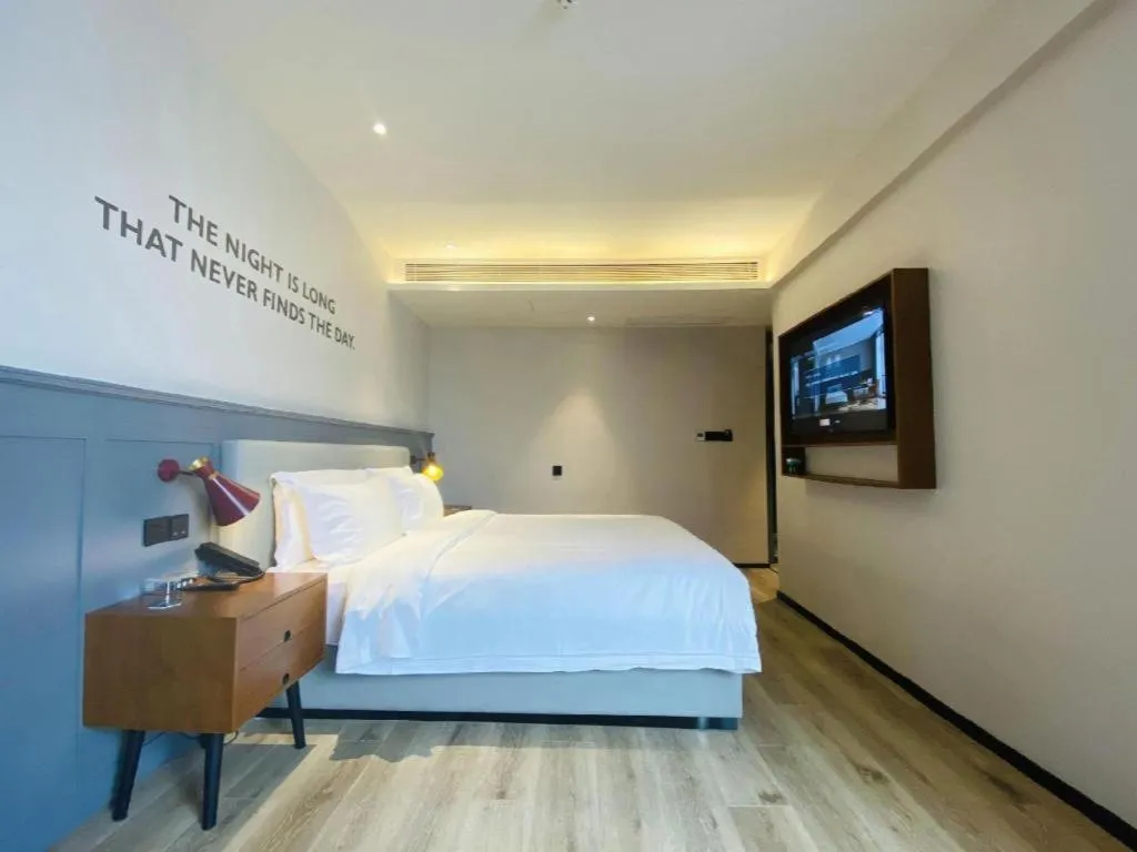 Bed in Premier City Comfort Hotel Wuhan Yellow Crane Shouyi Road Metro Station