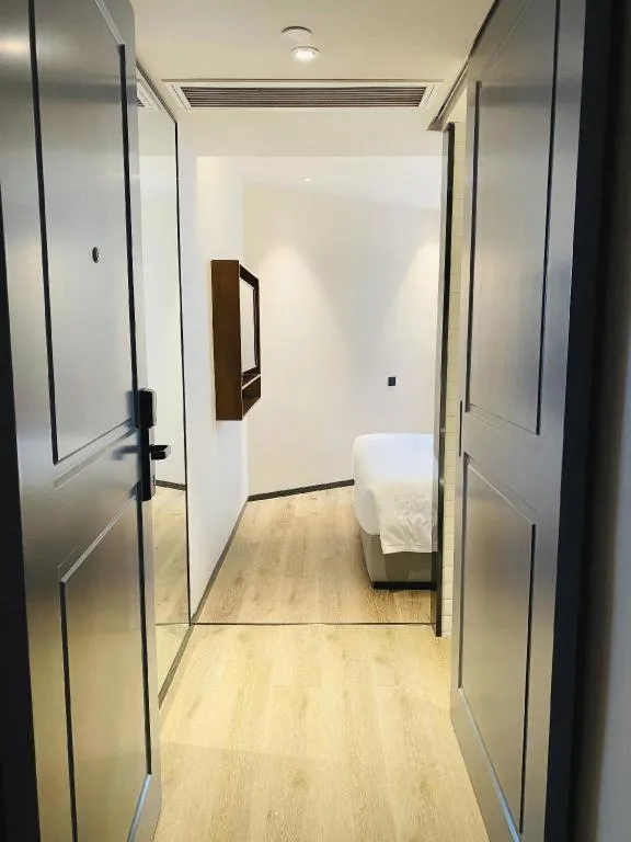 Bed in Premier City Comfort Hotel Wuhan Yellow Crane Shouyi Road Metro Station