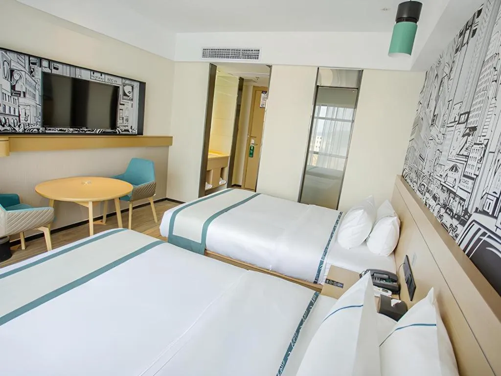 Bed in City Comfort Inn Yangxin High-speed Railway Station