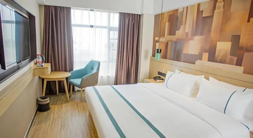 Bed in City Comfort Inn Yangxin High-speed Railway Station